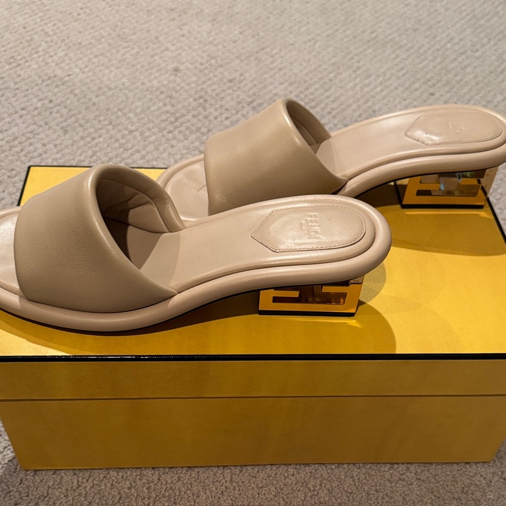 Fendi Cream Mules with Gold Accent